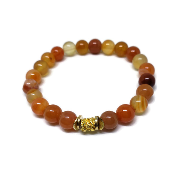 8 mm Natural Carnelian stretch bracelet with gold plated tube and spacers
